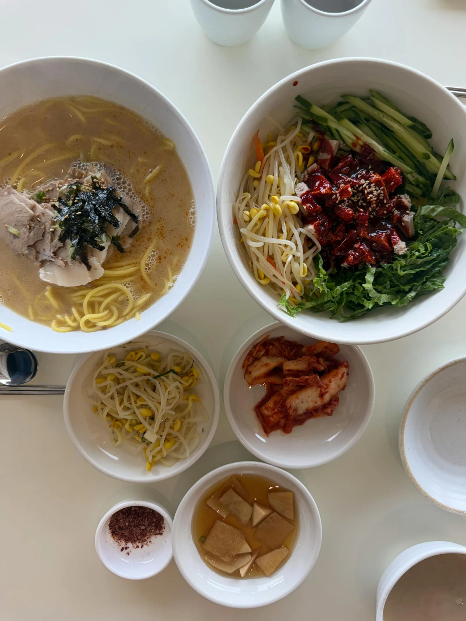 Balanced Korean meal table with varied dishes and vegetables.