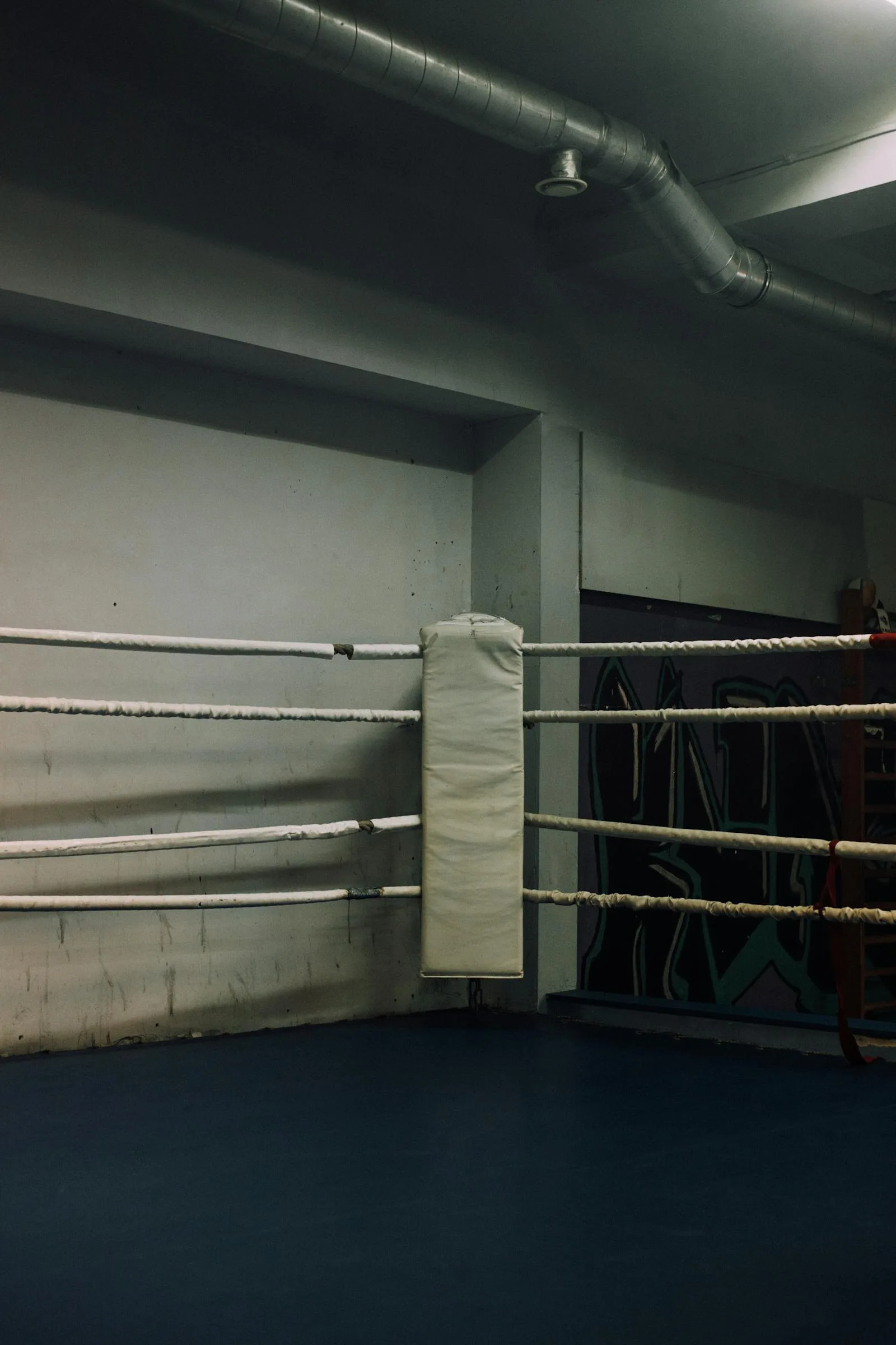 Boxing gym interior with equipment before class.