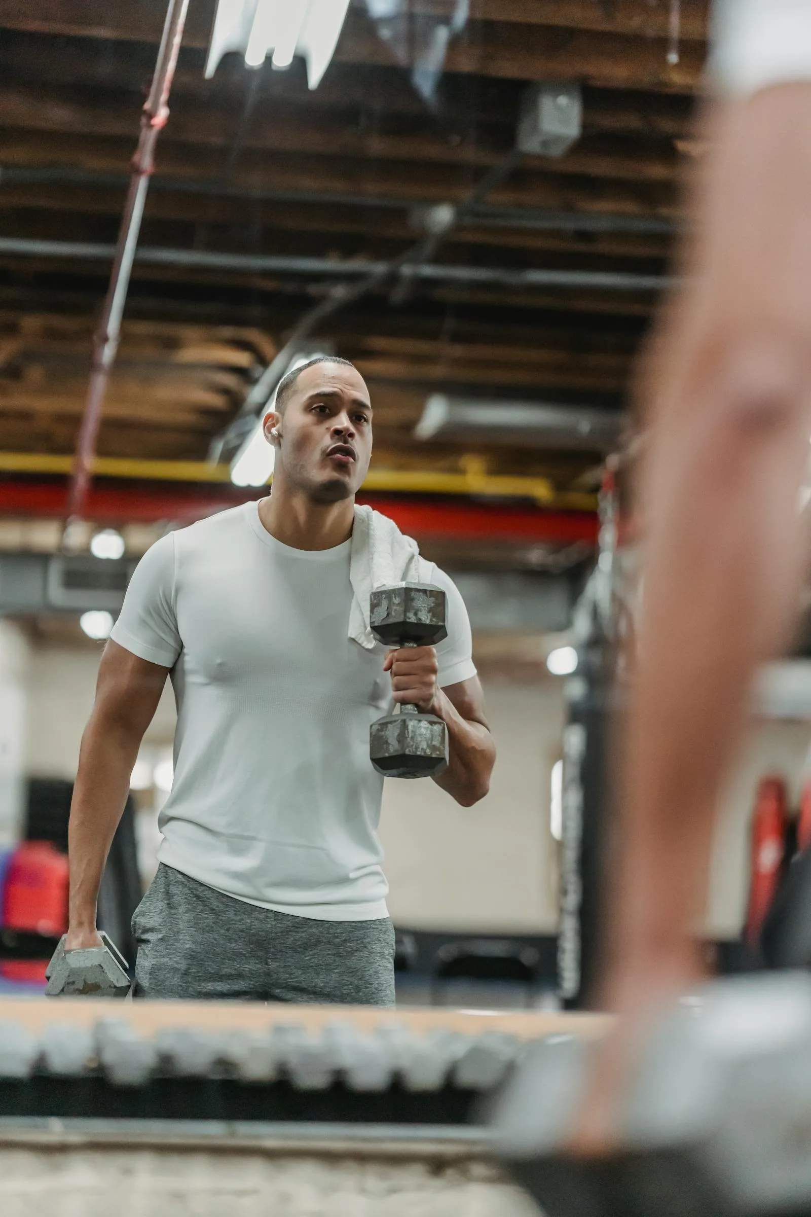 Focused dumbbell training used to show strength work benefits.